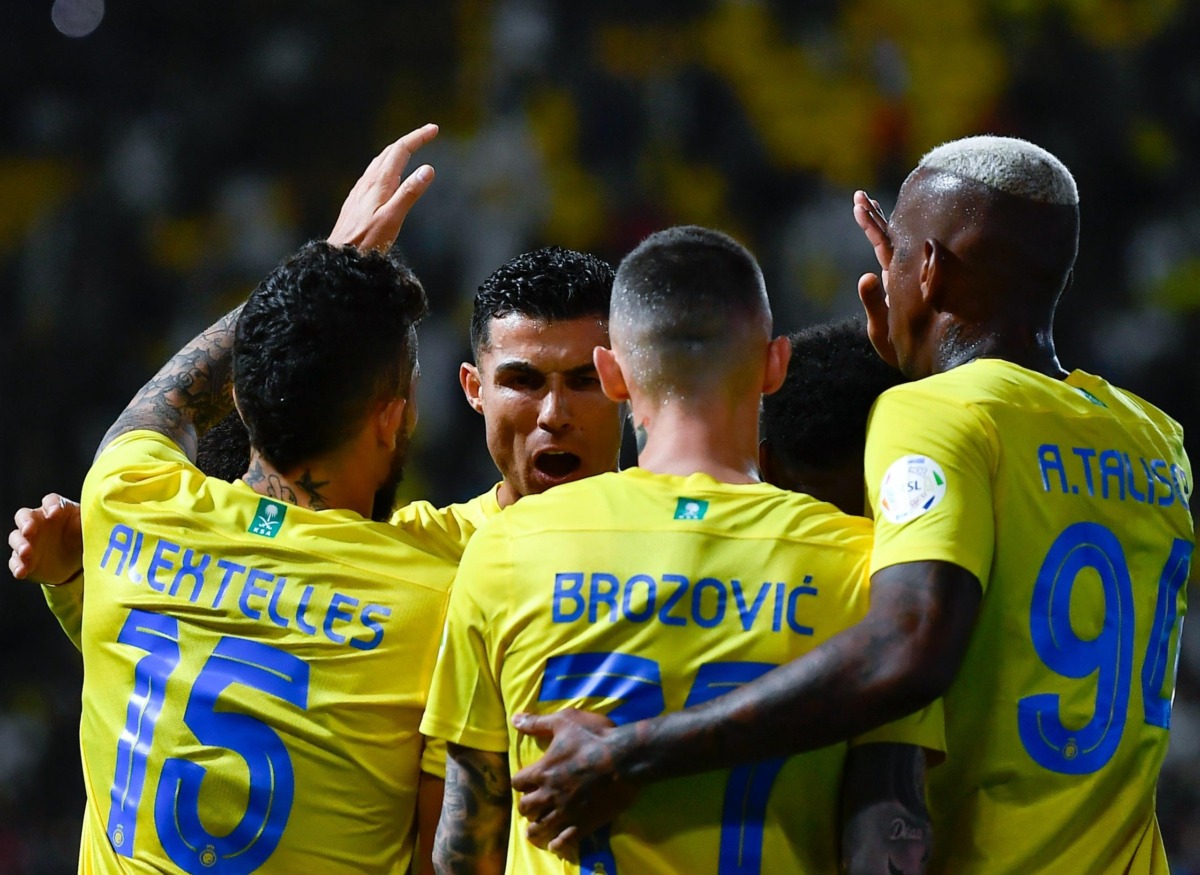 رونالدو وأوتافيو يهديان النصر فوزاً صعباً على الفتح